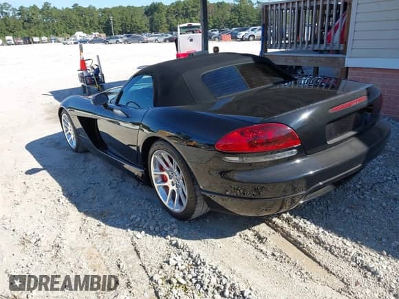 2005 Dodge Viper SRT-10 z VIN 1B3JZ65Z85V500374, wystawiony jako IAAI lot #43543522 z przebiegiem 41 503 mil mil oraz . Historia ofert i sprzedaży dostępna na DreamBid. Obrazek 3.