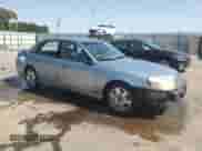 2005 Saturn L with VIN 1G8JD54R05Y501357, listed as a Copart auction lot 56891625 with 296,454 mi miles and Salvage title. Bid and sale history available at DreamBid. Image 4.