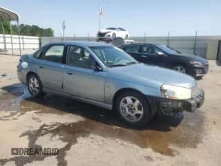 2005 Saturn L with VIN 1G8JD54R05Y501357, listed as a Copart auction lot 56891625 with 296,454 mi miles and Salvage title. Bid and sale history available at DreamBid. Image 4.
