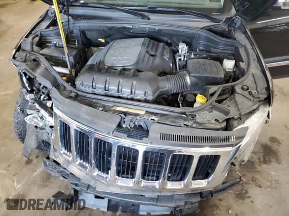 2013 Jeep Grand Cherokee Limited с VIN 1C4RJFBT4DC545458, выставлен на аукционе Copart как лот 68581645 с пробегом 119 383 миль миль и На запчасти • Non repairable. История ставок и продаж доступна на DreamBid. Изображение 12.