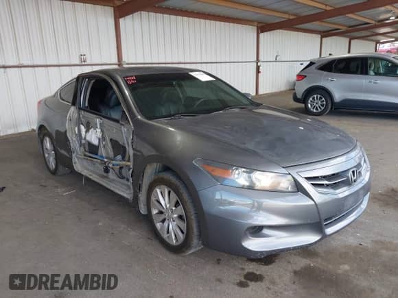 2012 Honda Accord LX-S with VIN 1HGCS1B34CA000023, listed as a IAAI auction lot 42910206 with 203,594 mi miles and . Bid and sale history available at DreamBid. Image 6.