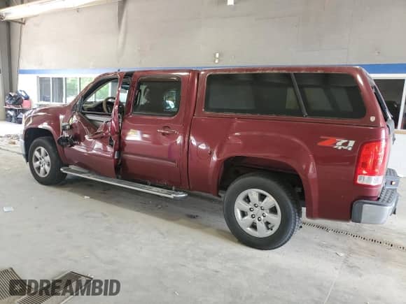 2009 GMC Sierra 1500 SLT with VIN 3GTEK33M79G226285, listed as a Copart auction lot 61543255 with 140,788 mi miles and Salvage title. Bid and sale history available at DreamBid. Image 2.