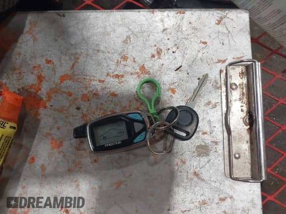 2004 Cadillac Escalade z VIN 1GYEK63N34R167569, wystawiony jako IAAI lot #43490315 z przebiegiem Nie podano mil oraz . Historia ofert i sprzedaży dostępna na DreamBid. Obrazek 11.