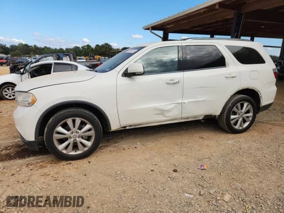 2012 Dodge Durango Crew with VIN 1C4RDHDG3CC257898, listed as a Copart auction lot 82149875 with 191,702 mi miles and Salvage title. Bid and sale history available at DreamBid. Image 1.