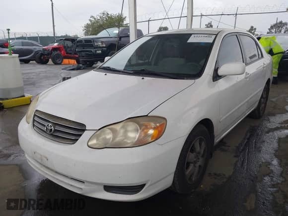 2004 Toyota Corolla CE z VIN JTDBR32E942041472, wystawiony jako IAAI lot #43225890 z przebiegiem 144 291 mil mil oraz . Historia ofert i sprzedaży dostępna na DreamBid. Obrazek 2.