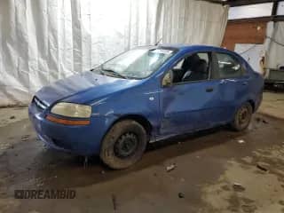 2005 Chevrolet Aveo LS z VIN KL1TD52625B438716, wystawiony jako Copart lot #55891325 z przebiegiem 142 944 mil mil oraz Szkoda całkowita • Salvage title. Historia ofert i sprzedaży dostępna na DreamBid. Obrazek 1.