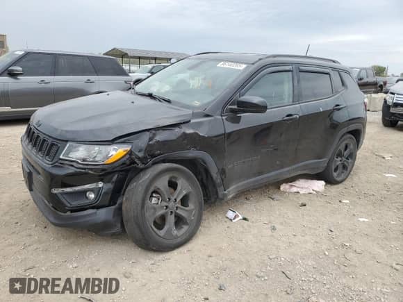 2019 Jeep Compass Altitude with VIN 3C4NJCBB2KT706637, listed as a Copart auction lot 86140265 with 161,415 mi miles and Salvage title. Bid and sale history available at DreamBid. Image 1.