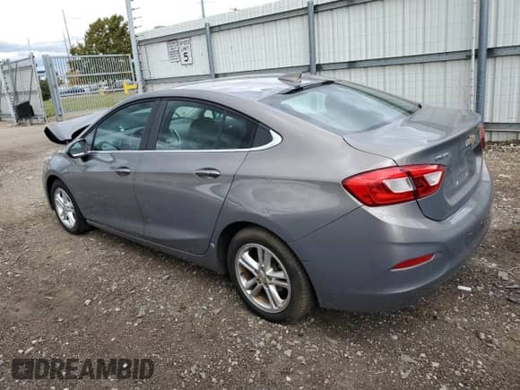 2018 Chevrolet Cruze LT с VIN 1G1BE5SM0J7118798, выставлен на аукционе Copart как лот 71520565 с пробегом 94 360 миль миль и Чистый • Clean title. История ставок и продаж доступна на DreamBid. Изображение 2.