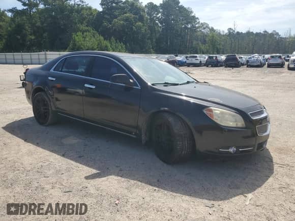 2009 Chevrolet Malibu LTZ with VIN 1G1ZK57B69F214922, listed as a Copart auction lot 61606465 with Not provided miles and Salvage title. Bid and sale history available at DreamBid. Image 4.