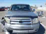 2004 Toyota Tundra SR5 z VIN 5TBDT44154S461290, wystawiony jako IAAI lot #43278955 z przebiegiem 200 462 mil mil oraz . Historia ofert i sprzedaży dostępna na DreamBid. Obrazek 12.