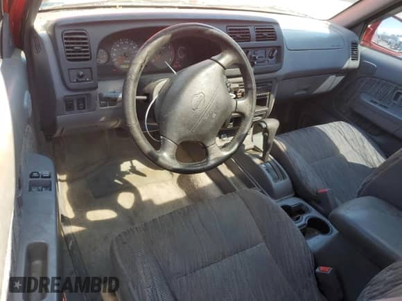 2000 Nissan Frontier XE с VIN 1N6ED26T5YC325984, выставлен на аукционе Copart как лот 50491335 с пробегом 245 567 миль миль и Чистый • Clean title. История ставок и продаж доступна на DreamBid. Изображение 8.