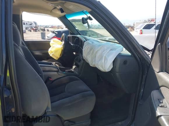 2003 GMC Sierra 1500 SLT z VIN 1GTEK19T03E191705, wystawiony jako IAAI lot #42145392 z przebiegiem Nie podano mil oraz . Historia ofert i sprzedaży dostępna na DreamBid. Obrazek 5.