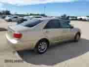 2005 Toyota Camry LE с VIN 4T1BE32K75U103812, выставлен на аукционе Copart как лот 84556275 с пробегом 221 127 миль миль и Списание • Salvage title. История ставок и продаж доступна на DreamBid. Изображение 3.