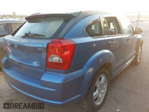 2007 Dodge Caliber SXT with VIN 1B3HB48B17D558695, listed as a IAAI auction lot 43033807 with 220,706 mi miles and . Bid and sale history available at DreamBid. Image 4.