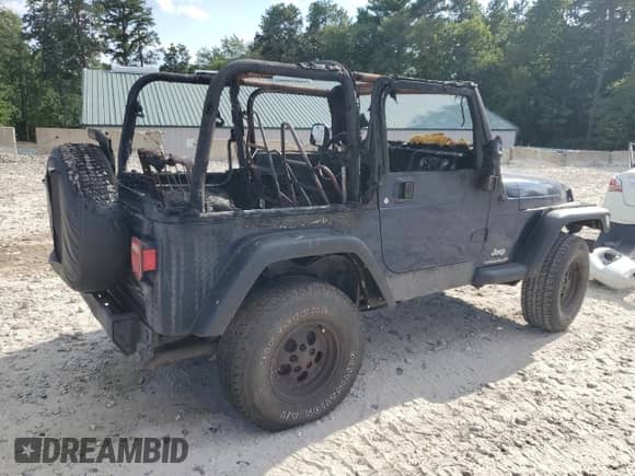 2005 Jeep Wrangler SE with VIN 1J4FA29165P333410, listed as a Copart auction lot 71223875 with Not provided miles and Clean title. Bid and sale history available at DreamBid. Image 3.