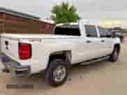 2015 Chevrolet Silverado 2500HD Work Truck z VIN 1GC1KUEG0FF185345, wystawiony jako Copart lot #58501835 z przebiegiem 194 581 mil mil oraz Czysty tytuł • Clean title. Historia ofert i sprzedaży dostępna na DreamBid. Obrazek 4.