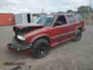 1999 Chevrolet Blazer LS z VIN 1GNCS13W2X2156012, wystawiony jako Copart lot #79730344 z przebiegiem 142 788 mil mil oraz Szkoda całkowita • Salvage title. Historia ofert i sprzedaży dostępna na DreamBid. Obrazek 1.