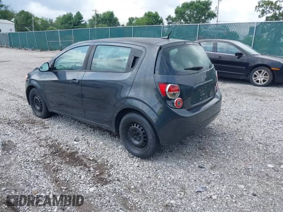 2014 Chevrolet Sonic LS with VIN 1G1JA6SH9E4146252, listed as a IAAI auction lot 42590935 with 143,413 mi miles and . Bid and sale history available at DreamBid. Image 3.