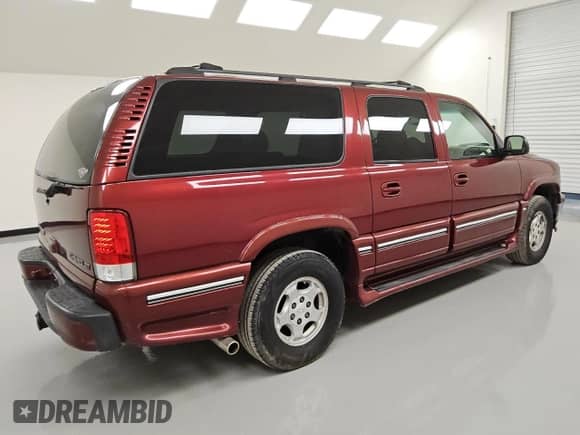 2003 Chevrolet Suburban LT z VIN 1GNFK16Z83J228298, wystawiony jako Copart lot #56543165 z przebiegiem 214 110 mil mil oraz Czysty tytuł • Clean title. Historia ofert i sprzedaży dostępna na DreamBid. Obrazek 3.