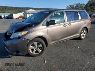 2014 Toyota Sienna L with VIN 5TDZK3DC5ES459617, listed as a Copart auction lot 85784815 with 162,085 mi miles and Salvage title. Bid and sale history available at DreamBid. Image 1.