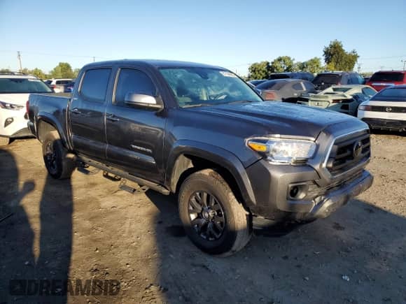 2023 Toyota Tacoma SR5 z VIN 3TMAZ5CN9PM214829, wystawiony jako Copart lot #87104895 z przebiegiem 10 509 mil mil oraz Szkoda całkowita • Salvage title. Historia ofert i sprzedaży dostępna na DreamBid. Obrazek 4.