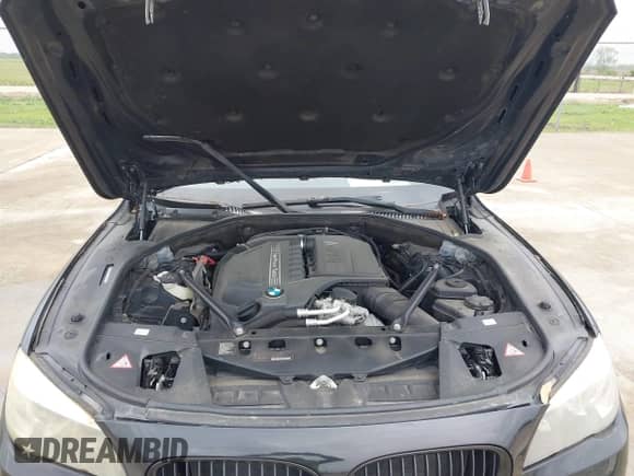 2013 BMW 7 Series 740Li xDrive with VIN WBAYF4C58DD281542, listed as a IAAI auction lot 41902450 with 152,031 mi miles and . Bid and sale history available at DreamBid. Image 10.