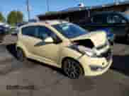 2013 Chevrolet Spark LT с VIN KL8CF6S94DC552057, выставлен на аукционе Copart как лот 81468525 с пробегом 96 842 миль миль и Списание • Salvage title. История ставок и продаж доступна на DreamBid. Изображение 4.