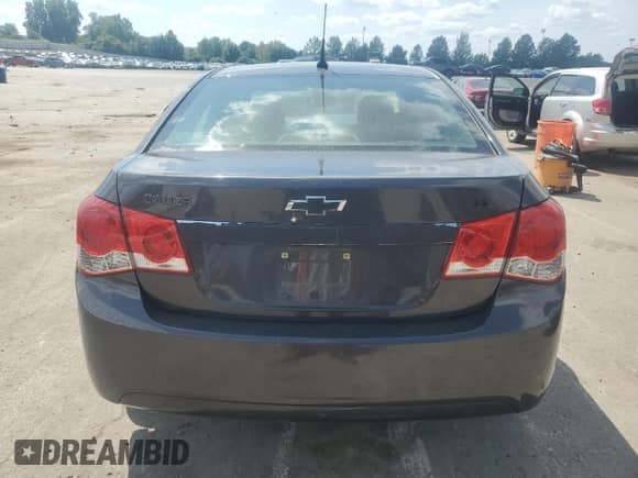 2014 Chevrolet Cruze 2LT z VIN 1G1PE5SB0E7239440, wystawiony jako Copart lot #71526725 z przebiegiem Nie podano mil oraz Szkoda całkowita • Salvage title. Historia ofert i sprzedaży dostępna na DreamBid. Obrazek 6.