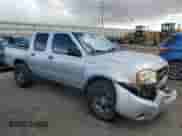 2004 Nissan Frontier XE with VIN 1N6ED27T54C407349, listed as a Copart auction lot 45731805 with 195,651 mi miles and Salvage title. Bid and sale history available at DreamBid. Image 4.