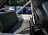 1991 Jeep Wrangler with VIN 2J4FY29P2MJ119803, listed as a Copart auction lot 79846984 with 155,204 mi miles and Salvage title. Bid and sale history available at DreamBid. Image 11.