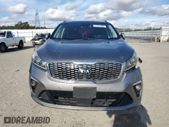 2019 Kia Sorento SX z VIN 5XYPK4A53KG453956, wystawiony jako Copart lot #71741505 z przebiegiem 100 634 mil mil oraz Szkoda całkowita • Salvage title. Historia ofert i sprzedaży dostępna na DreamBid. Obrazek 5.