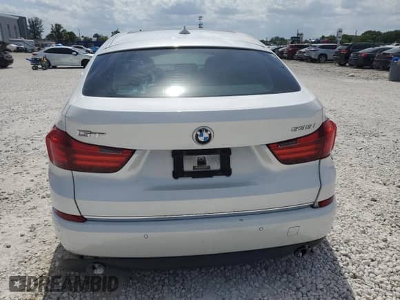 2015 BMW 5 Series 535i Gran Turismo с VIN WBA5M2C5XFD872276, выставлен на аукционе Copart как лот 58240285 с пробегом 92 079 миль миль и Списание • Salvage title. История ставок и продаж доступна на DreamBid. Изображение 6.