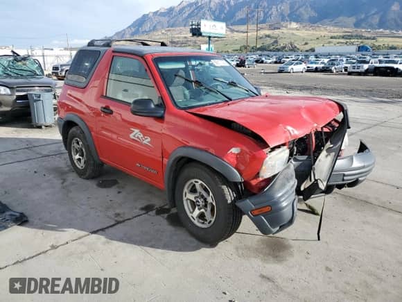 2001 Chevrolet Tracker with VIN 2CNBJ78C616925867, listed as a Copart auction lot 86811305 with Not provided miles and Salvage title. Bid and sale history available at DreamBid. Image 4.