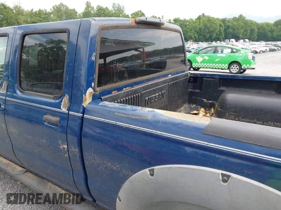 2002 Nissan Frontier XE with VIN 1N6ED29Y22C362795, listed as a IAAI auction lot 42432950 with 180,270 mi miles and . Bid and sale history available at DreamBid. Image 12.