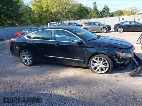 2014 Chevrolet Impala LTZ with VIN 2G1145SL7E9157706, listed as a IAAI auction lot 43401774 with 138,607 mi miles and . Bid and sale history available at DreamBid. Image 13.