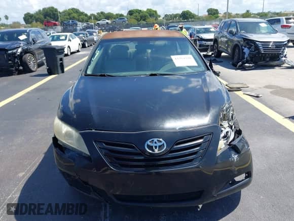 2007 Toyota Camry XLE z VIN JTNBE46K373075368, wystawiony jako IAAI lot #43354330 z przebiegiem 361 006 mil mil oraz . Historia ofert i sprzedaży dostępna na DreamBid. Obrazek 12.