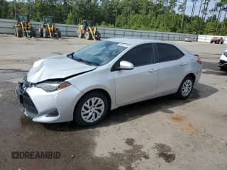 2019 Toyota Corolla L с VIN 5YFBURHE7KP936594, выставлен на аукционе Copart как лот 80837165 с пробегом 73 538 миль миль и Списание • Salvage title. История ставок и продаж доступна на DreamBid. Изображение 1.