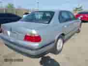 1998 BMW 7 Series 740iL z VIN WBAGJ8324WDM11469, wystawiony jako IAAI lot #42069641 z przebiegiem Nie podano mil oraz . Historia ofert i sprzedaży dostępna na DreamBid. Obrazek 4.