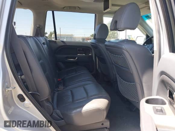 2006 Honda Pilot EX-L z VIN 2HKYF18606H511736, wystawiony jako IAAI lot #42731682 z przebiegiem 142 934 mil mil oraz . Historia ofert i sprzedaży dostępna na DreamBid. Obrazek 8.