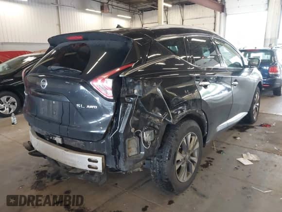 2015 Nissan Murano SL with VIN 5N1AZ2MH5FN213104, listed as a IAAI auction lot 42568737 with 124,119 mi miles and . Bid and sale history available at DreamBid. Image 4.