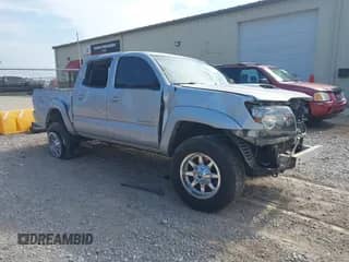 2010 Toyota Tacoma PreRunner z VIN 3TMJU4GN0AM095417, wystawiony jako IAAI lot #42834140 z przebiegiem 166 741 mil mil oraz . Historia ofert i sprzedaży dostępna na DreamBid. Obrazek 1.