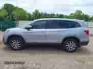 2021 Honda Pilot EX-L z VIN 5FNYF5H50MB038964, wystawiony jako IAAI lot #42232808 z przebiegiem 94 909 mil mil oraz . Historia ofert i sprzedaży dostępna na DreamBid. Obrazek 14.