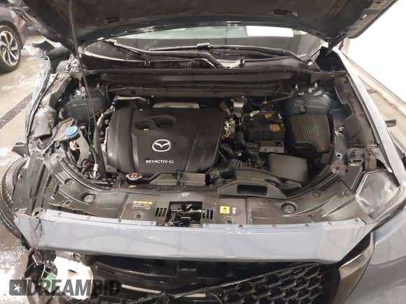 2022 Mazda CX-5 S Preferred z VIN JM3KFBCM0N0644033, wystawiony jako IAAI lot #41620156 z przebiegiem 23 280 mil mil oraz . Historia ofert i sprzedaży dostępna na DreamBid. Obrazek 10.