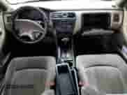 1999 Honda Accord LX с VIN 1HGCG5648XA050635, выставлен на аукционе Copart как лот 80455195 с пробегом Не указан миль и Списание • Salvage title. История ставок и продаж доступна на DreamBid. Изображение 8.