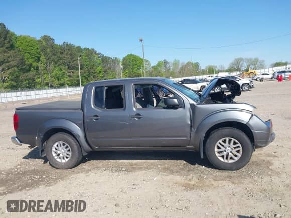 2016 Nissan Frontier SV with VIN 1N6AD0EV4GN787901, listed as a IAAI auction lot 42018254 with 120,845 mi miles and . Bid and sale history available at DreamBid. Image 13.