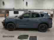 2022 Mazda CX-5 S Preferred z VIN JM3KFBCM1N0551165, wystawiony jako IAAI lot #42277023 z przebiegiem 34 115 mil mil oraz . Historia ofert i sprzedaży dostępna na DreamBid. Obrazek 13.
