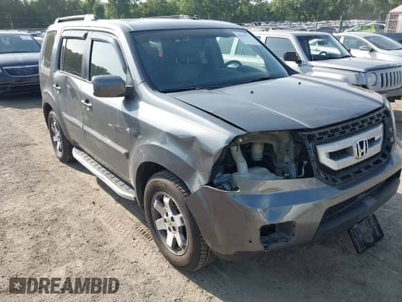 2010 Honda Pilot Touring with VIN 5FNYF4H88AB012001, listed as a IAAI auction lot 42635771 with 287,115 mi miles and . Bid and sale history available at DreamBid. Image 6.