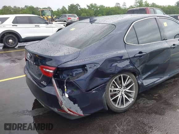 2021 Toyota Camry Hybrid XLE with VIN 4T1F31AK4MU546558, listed as a IAAI auction lot 42235763 with 62,299 mi miles and . Bid and sale history available at DreamBid. Image 17.