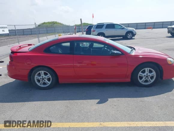 2003 Dodge Stratus SE z VIN 4B3AG42G83E063596, wystawiony jako IAAI lot #42867839 z przebiegiem 130 475 mil mil oraz . Historia ofert i sprzedaży dostępna na DreamBid. Obrazek 13.