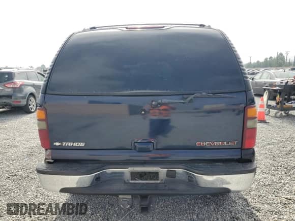 2006 Chevrolet Tahoe LS with VIN 1GNEC13V46R162171, listed as a Copart auction lot 59818735 with 209,145 mi miles and Salvage title. Bid and sale history available at DreamBid. Image 6.